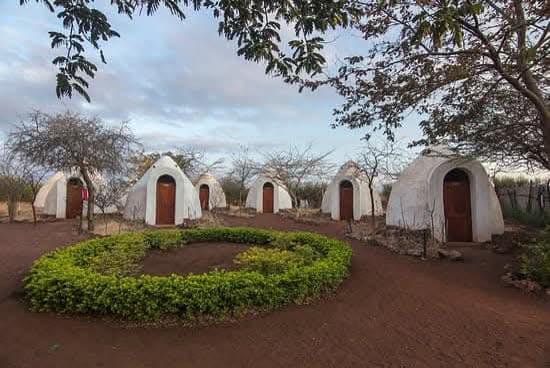 Round bungalow-style lodge accommodation near Moshi, Tanzania