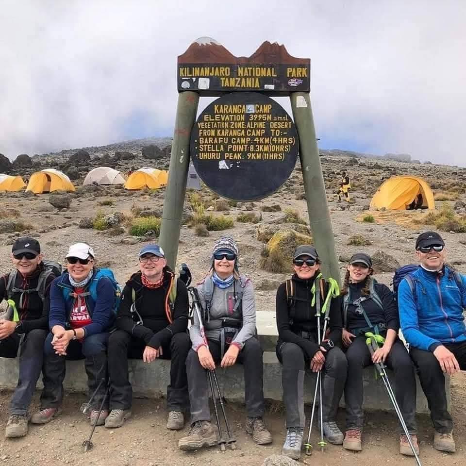 NGULI climbers at the Kilimanjaro National Park gate before their trek